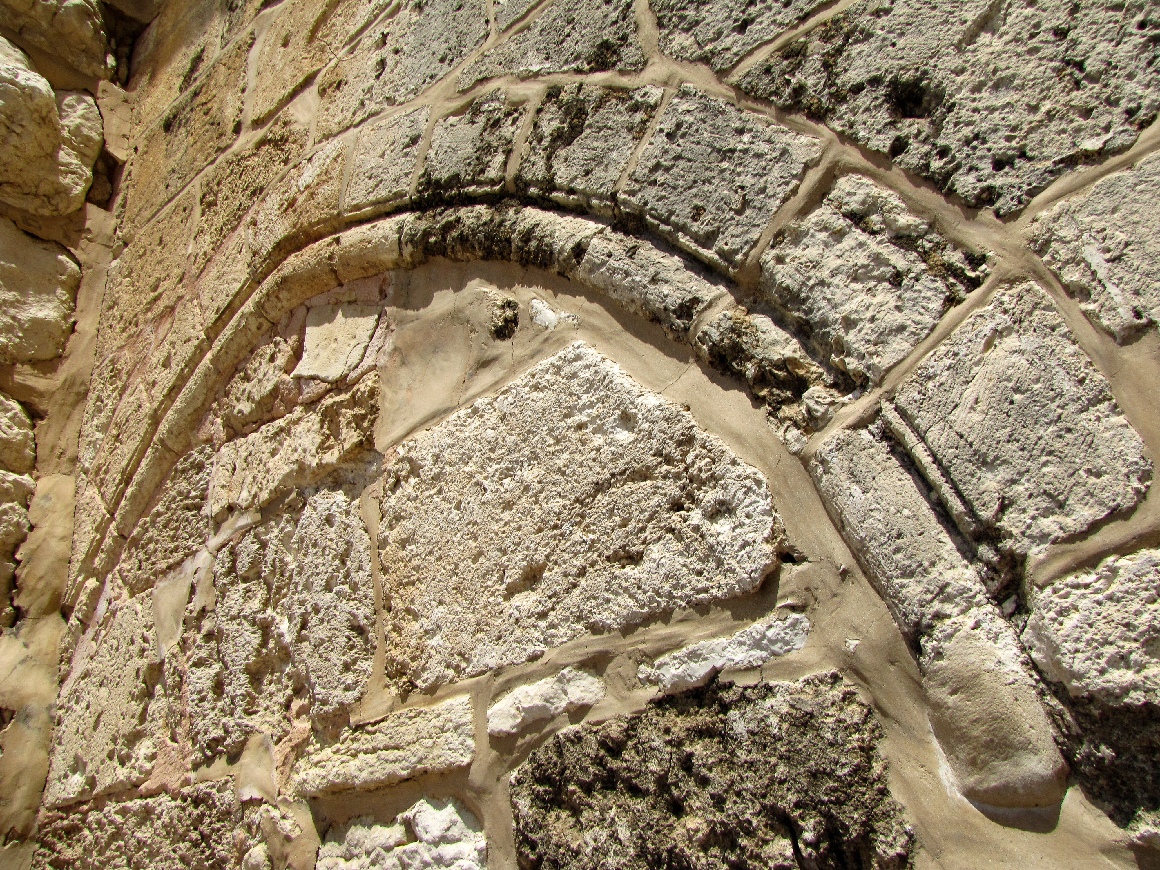 Sealed up and blocked larger church entrance from earlier period in history